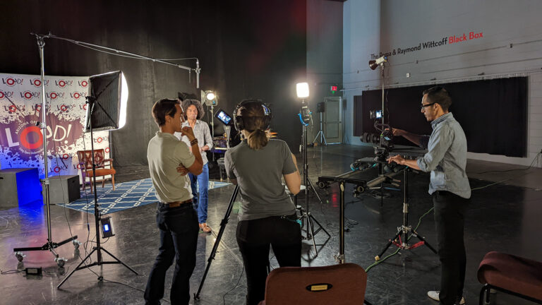 Behind the scenes photo of a video production